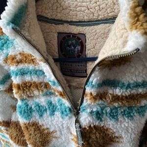 Blue, white, tan colored women’s cabin fever fleece pullover